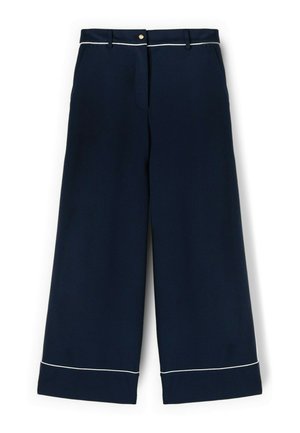 Marineblauwe wijde pantalons met witte bies op de manchetten en tailleband, knoopsluiting aan de voorkant en ceintuurlussen.