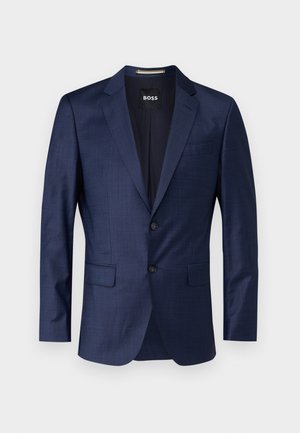 Mornarsko plavi blejzer od teksturiranog materijala s reverima, dva dugmeta i bočnim džepovima. Unutarnja oznaka nosi natpis "BOSS."