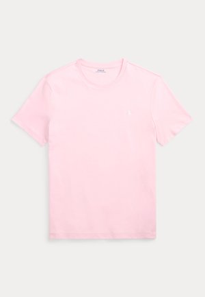 Halvány rózsaszín, rövid ujjú, kerek nyakú póló, a bal mellkason egy kis fehér, hímzett Polo Ralph Lauren logóval.