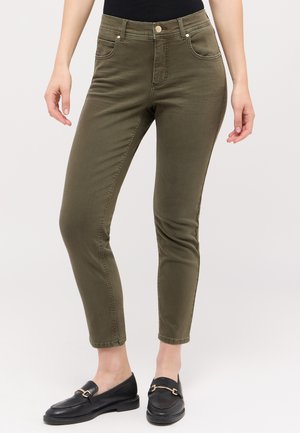 Olive green slim-fit pants with a mid-rise waist, five pockets, and subtle stitching details. Material appears smooth and slightly stretchy.