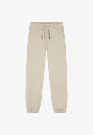 Beige joggerbroek met elastische tailleband, trekkoord, zijzakken, elastische boorden en klein wit "BALLIN" logo op de linker dij.