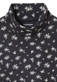 Schwarzes Rollkragenoberteil mit kleinem weißen Blumenmuster, Größe 6 Jahre, 116 cm, von Vertbaudet.