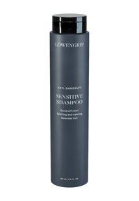 Mørkegrå, cylindrisk shampooflaske med en sort hætte. Hvid tekst, der angiver "Anti-dandruff" og "Sensitive Shampoo." 250 ml kapacitet.