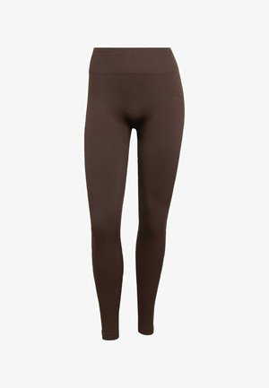 Brown leggings made of stretchy fabric, featuring a high waistband and a smooth texture with a fitted design. No visible patterns or accents.