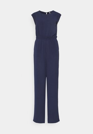 Mono azul marino hecho de tela suave. Presenta mangas cortas, una cintura elástica y pantalones de pierna ancha. Cuello redondo simple.