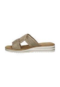 Beige woven slide sandal with crisscross straps, soft suede insole, and a white ridged sole. Features a low, cushioned platform design.