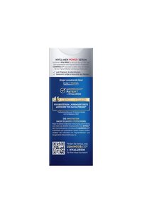 Blue and silver packaging for NIVEA Men Power Serum. Text detailing anti-aging and pigment-reducing benefits. QR code present.