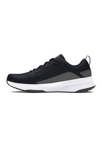 Zapatillas deportivas negras con parte superior lisa, acentos grises, entresuela blanca acolchada y suela exterior de goma texturizada. Incluye cordones y una tira en el talón.