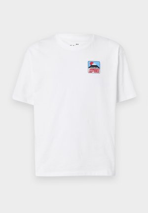 White short-sleeve t-shirt made of cotton featuring a colorful graphic patch with a mountain and red circle on the chest.