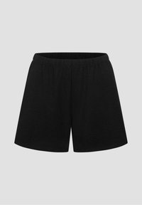 Zwarte korte broek gemaakt van zachte stof, met een elastische tailleband, losse pasvorm en een gladde textuur. Eenvoudig ontwerp zonder patronen.