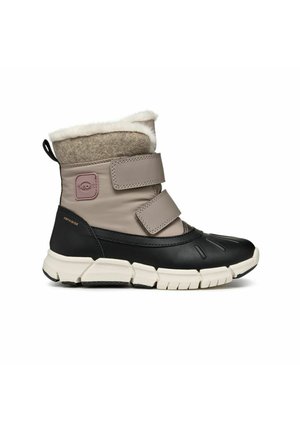 Botas hasta la mitad de la pantorrilla en negro y beige con forro de tela, correas ajustables, suela texturizada y parte inferior de goma. Adecuadas para clima frío.