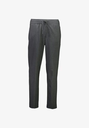 Graue Leggings mit schmalem Schnitt, ausgestattet mit einem elastischen Bund und einer Kordel zur Anpassung des Tragekomforts. Glatte Textur, minimales Design.