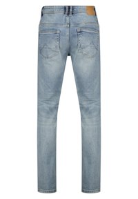 Light blue denim jeans with a slim fit, featuring two back pockets, visible stitching, and a leather patch at the waistband.