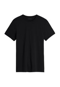 Camiseta negra de manga corta hecha de algodón suave, con un cuello redondo y un ajuste relajado con dobladillo recto.