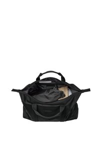 Sac de sport noir avec doubles poignées et fermeture éclair. L'intérieur comporte plusieurs compartiments et une pochette à cordon. Tissu durable et forme structurée.