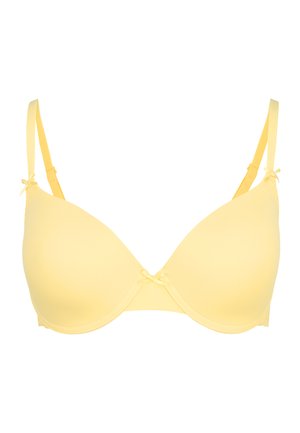 Gelb gepolsterter BH aus glattem Material, mit verstellbaren Trägern und dekorativen Schleifenakzenten in der Mitte und an den Trägerverbindungen.