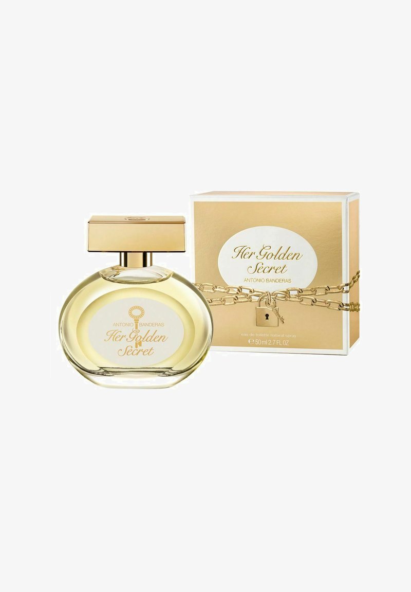 Läpinäkyvä ovaalin muotoinen hajustepullo kultaisella korkilla ja "Her Golden Secret" -etiketillä, vieressään ketjuun ja lukkoon kääritty kultainen ja valkoinen laatikko.