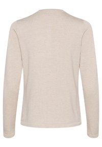 T-shirt à manches longues en beige clair, texture côtelée, col rond, coupe décontractée, sans marquage ni embellissements visibles.