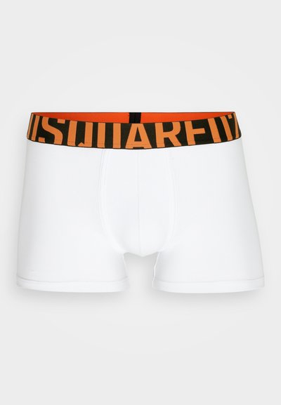 White boxer briefs with a black and orange logo waistband, featuring a snug fit, smooth texture, and traditional design.