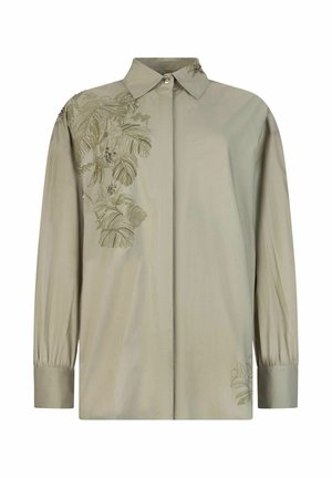 Chemise vert olive clair à manches longues avec un col pointu, ornée de broderies florales et de délicates perles sur l'épaule et le bas côté.