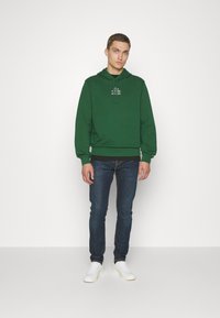 Lacoste SUBTLE LOGO UNISEX - Felpa con cappuccio - green