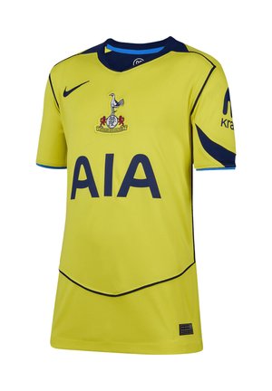 Maillot de football jaune du Tottenham Hotspur avec logo Nike bleu marine, texte du sponsor AIA et écusson du club sur la poitrine.