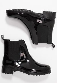 Rieker Bottes en caoutchouc - black