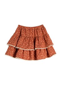 Kerut rok berwarna karat terbuat dari katun dengan cetakan bunga kecil, menampilkan renda di sepanjang tepi bawah dan dilengkapi dengan pinggang elastis.