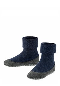 Marineblaue Knöchelsocken mit umgeschlagenem Bündchen und einer grauen Filzsohle, die mit rutschfesten Punkten für besseren Halt und Wärme ausgestattet ist.