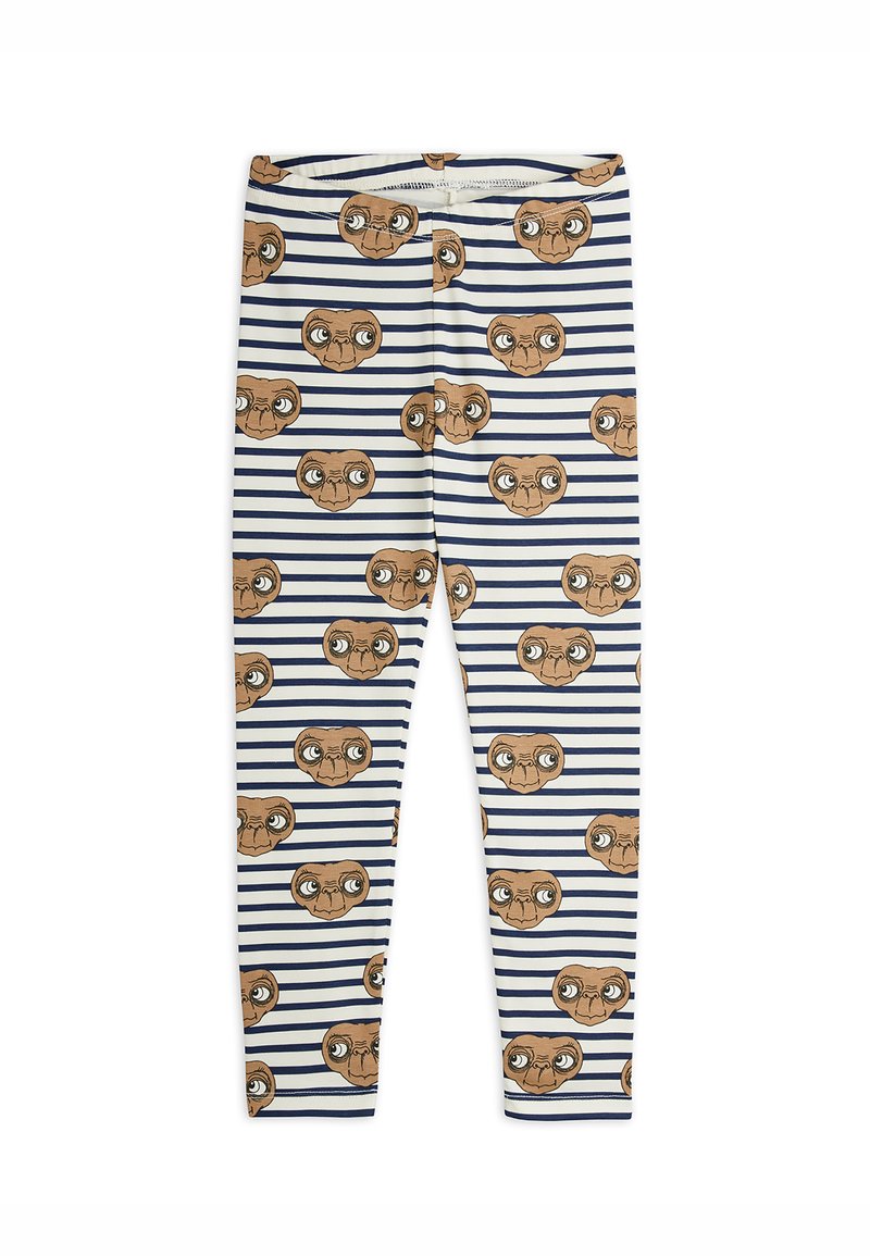 Rugalmas anyagból készült leggings, fehér alapon navy csíkokkal és ismétlődő barna idegenfej mintákkal. Simaság és testhezálló dizájn jellemzi.