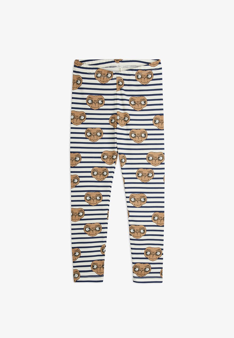 Rugalmas anyagból készült leggings, fehér alapon navy csíkokkal és ismétlődő barna idegenfej mintákkal. Simaság és testhezálló dizájn jellemzi.