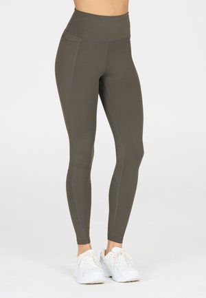 Hoge taille olijfgroene leggings van rekbare stof, met platte naden en ribbelaccenten langs de onderbenen.