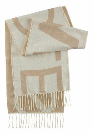 Beżowo-kremowy pleciony szalik z geometrycznym wzorem i frędzlami na brzegach, złożony na tle białego tła.