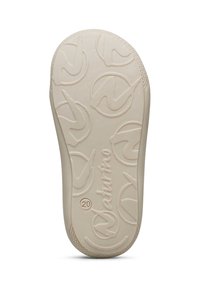 Suola di scarpa in gomma beige caratterizzata da un motivo testurizzato con forme circolari e il nome del marchio "Naturino" impresso vicino al tallone.