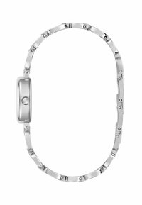 A silver bracelet with a sleek, curvy design and an oval shape, featuring links and a rounded clasp mechanism.