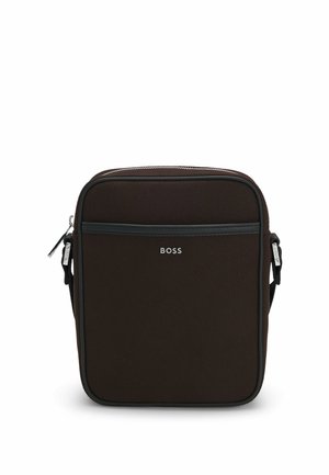 Small dark brown crossbody bag with front pocket, silver BOSS logo, zipper closure, and adjustable black strap.