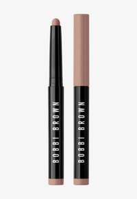 Matte Lippenstift in einer schwarzen Hülle mit weißer Markenbeschriftung; ein Ende hat eine rosé-nude Spitze, das andere Ende ist mit einer passenden Kappe versehen.
