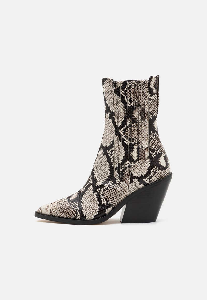 Pointed-toe ankle boot in faux snake print, featuring a textured surface with black and cream patterns, and a stacked black heel.