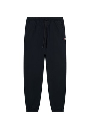 Czarne spodnie dresowe z elastycznym pasem i sznurkiem, żebrowanymi ściągaczami oraz małym logo na lewym udzie. Gładka faktura tkaniny.