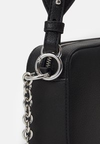 DKNY CAMERA BAG WITH STUDS - Handbag - black/silver