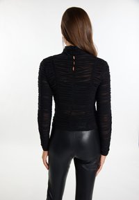 faina EMBELL - Langarmshirt - schwarz