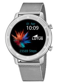Orologio smart in argento con schermo touch rotondo che mostra un design colorato. Le caratteristiche includono numeri romani e un bracciale a rete. Mostra i passi e la data.