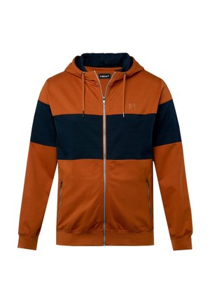 Mikina s kapucí na zip, s oranžovou horní částí a tmavě modrým spodním panelem. Má dlouhé rukávy, boční kapsy a šňůrku na kapuci.