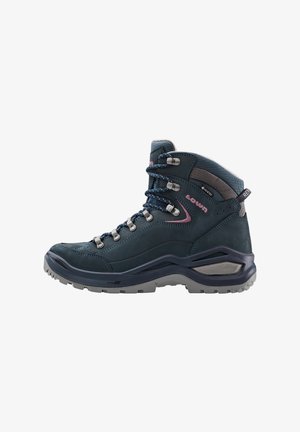 Kesel tengah sepatu hiking berwarna suede teal gelap dengan aksen abu-abu, dilengkapi dengan sol bertekstur, lubang tali logam, dan tali yang kontras. Desain tahan air.