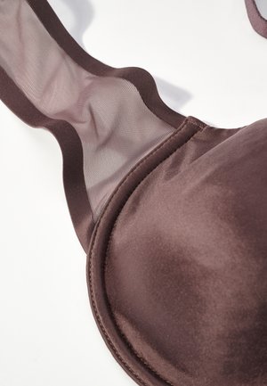 Brown satin bra with soft cups and sheer mesh detailing on the straps. Smooth texture with curved edges. No visible hardware or accents.