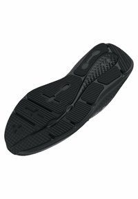 Černá podešev tenisky s texturovanými gripovými vzory, segmentovaným vzorkem a malým stylizovaným figurálním motivem blízko oblasti paty.