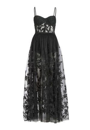 Vestito nero senza maniche con sovrapposizione di pizzo floreale trasparente, corpino aderente e gonna lunghezza caviglia fluida.