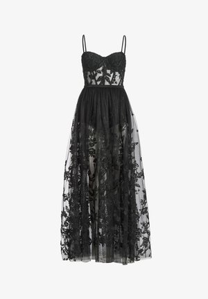 Vestito nero senza maniche con sovrapposizione di pizzo floreale trasparente, corpino aderente e gonna lunghezza caviglia fluida.