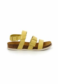 Sandal in pelle gialla con due cinturini regolabili, soletta in sughero e suola in gomma bianca. Presenta una fibbia per una vestibilità sicura.