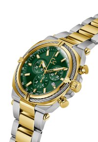 Klocka i rostfritt stål med guld- och silverfärgad finish, med en grön urtavla, tre subdials och ett datumfönster. Utrustad med en länkad armbandsband och texturerade detaljer.